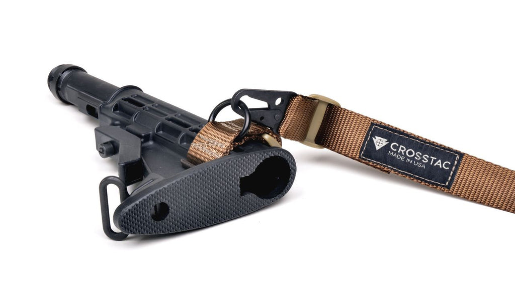 Buttstock sling adapter with 2 point sling clipped in